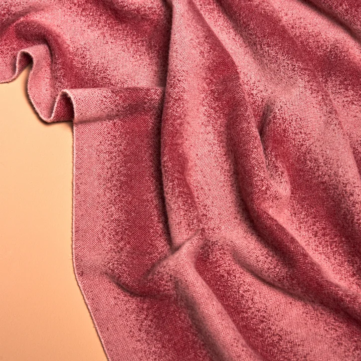 Tide Bedspread from Schneid in burgundy & blush