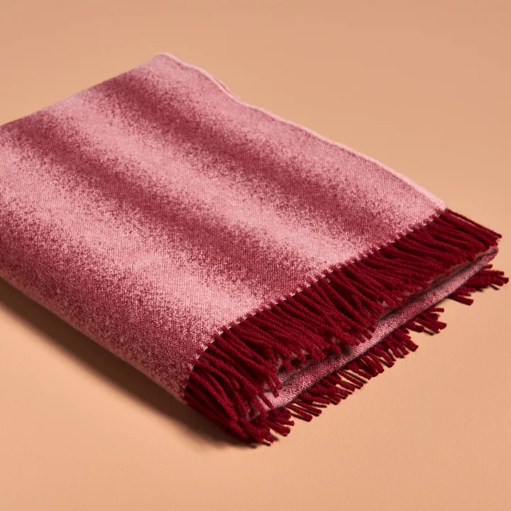 Tide Bedspread from Schneid in burgundy & blush