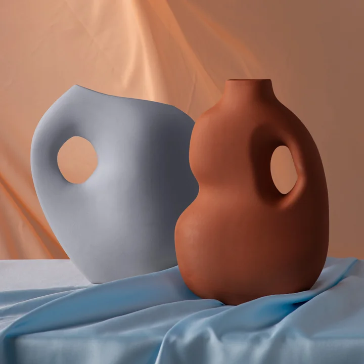 Aura Vase I in powder blue and Vase II in rust by Schneid