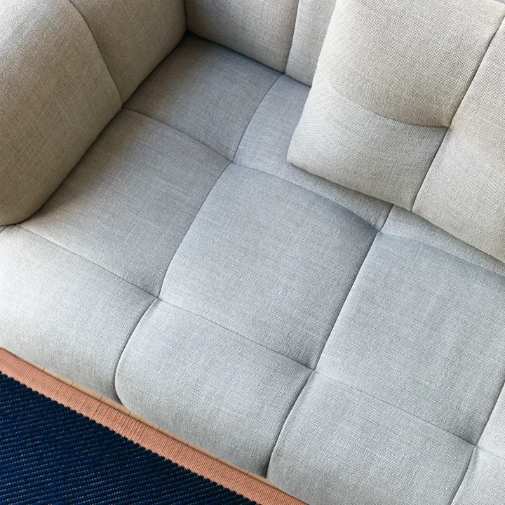 Quilton 3-seater sofa from HAY in the version Linen Grid adriatic blue