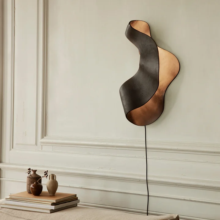 Oyster wall lamp by Ferm Living in the colour black