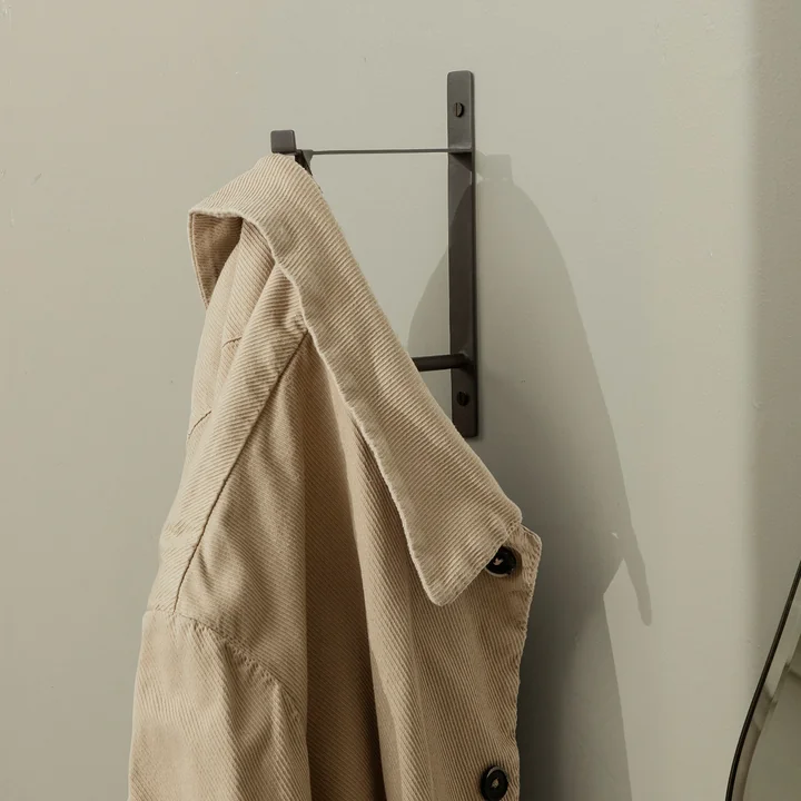 Clothes wall hook by Ferm Living in the version brass black