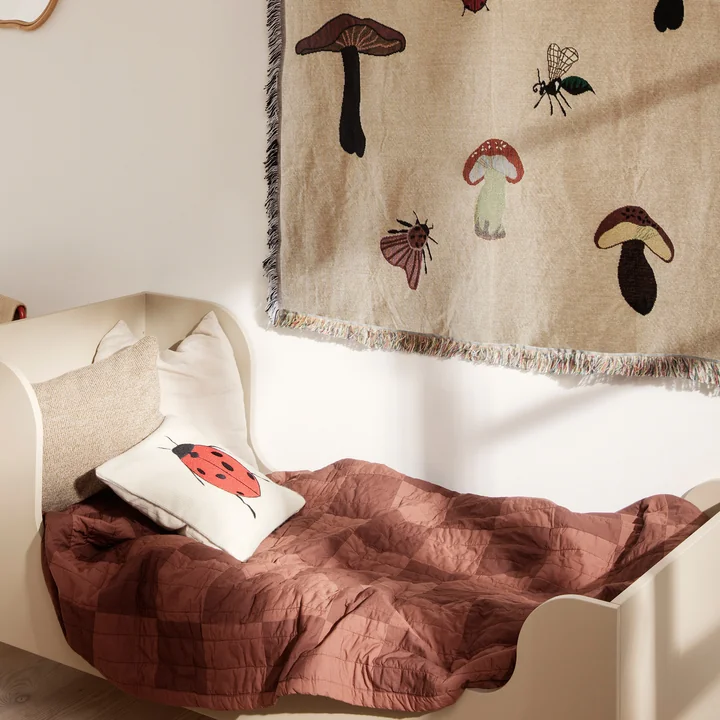Duo quilt from Ferm Living in the color red-brown