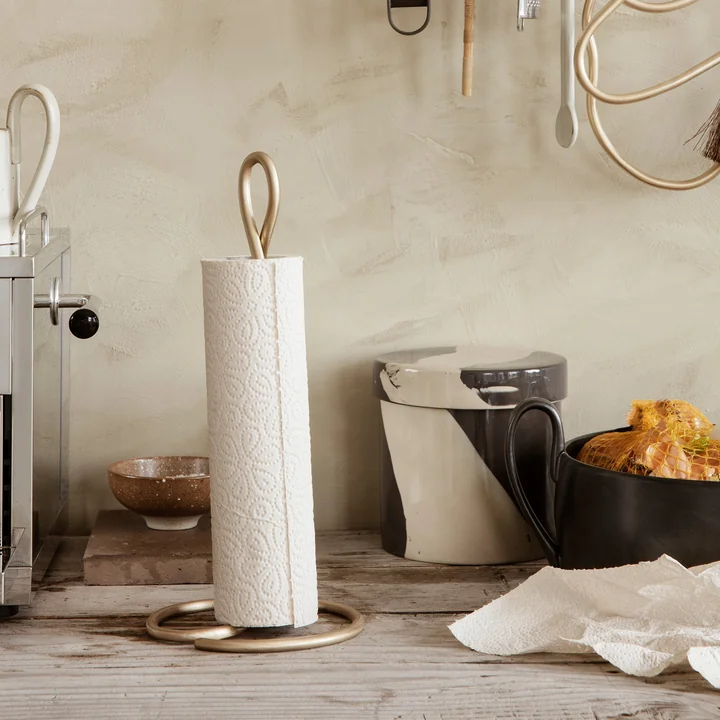 Curvature Kitchen roll holder by Ferm Living in the brass finish