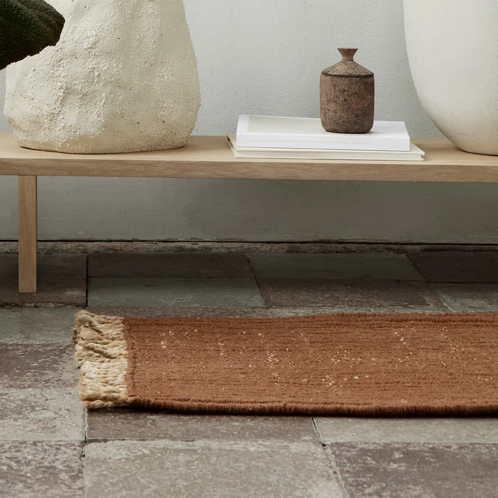 Block doormat by Ferm Living in the color brick red