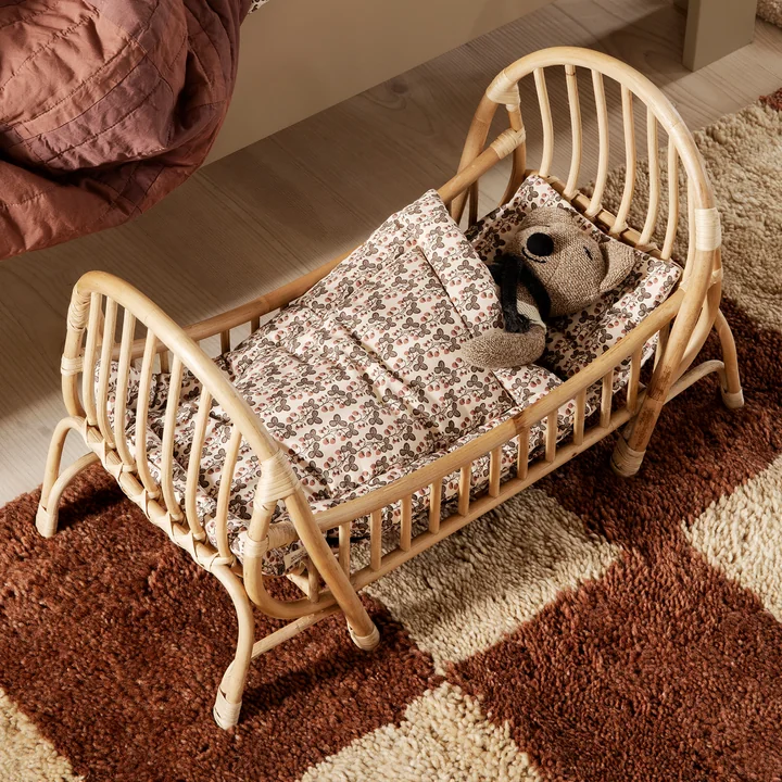 Bedding for Kuku doll's bed by Ferm Living in the design strawberry