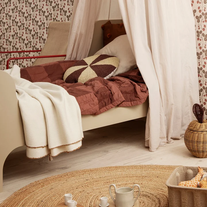 Arch cushion from Ferm Living in the brick red / off-white version