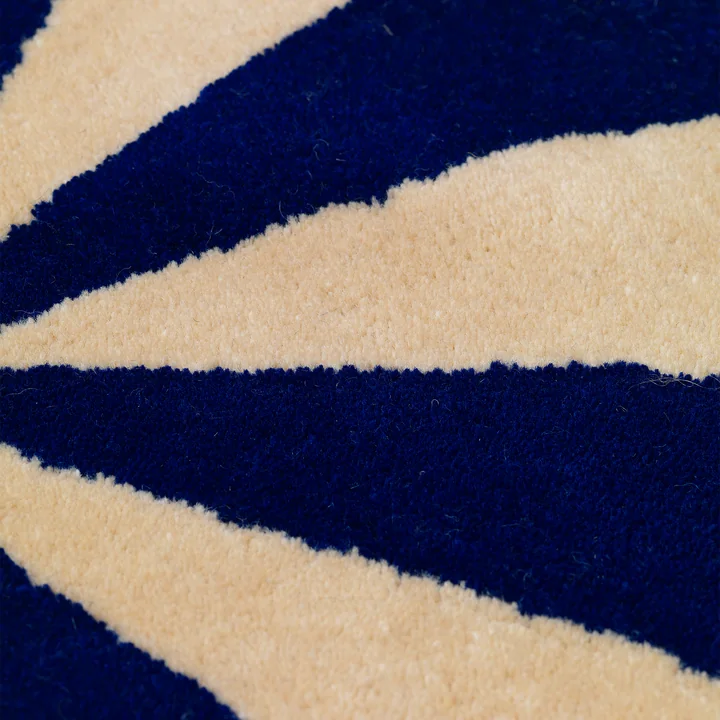 Arch Tufted rug from Ferm Living in the version blue / off-white