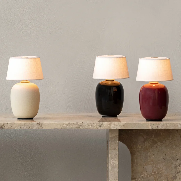 Stylish lights made of textile, ceramic and steel