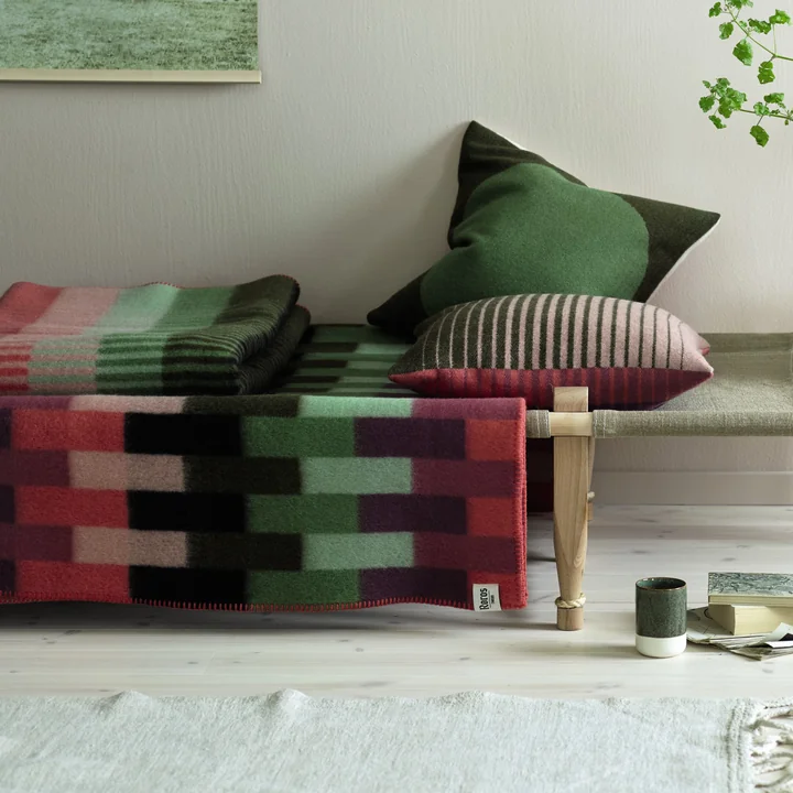 Åsmund cushion and wool blanket from Røros Tweed