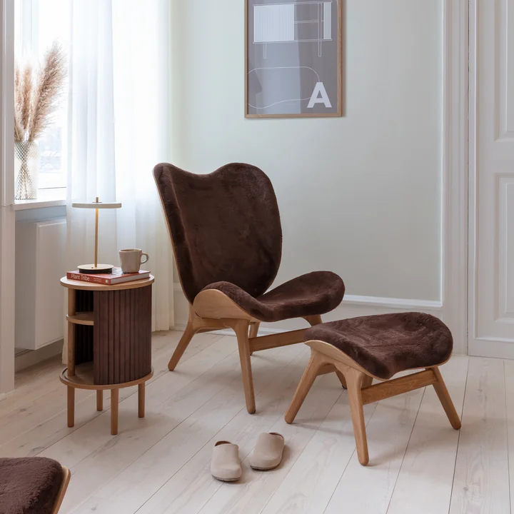 A Conversation Piece Tall armchair and ottoman by Umage