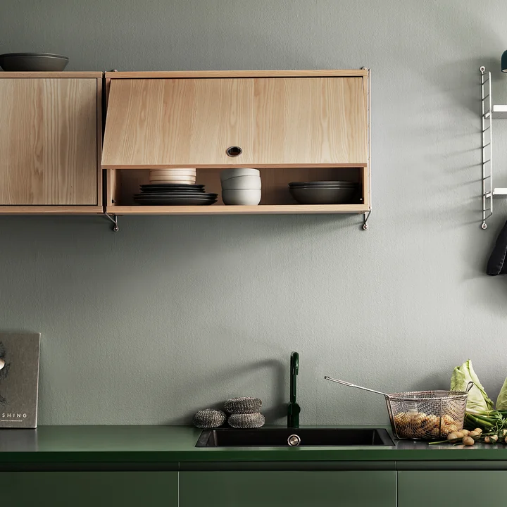 Wardrobe element with flap door from String