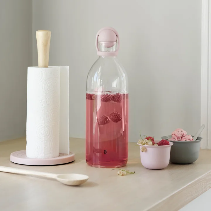 Roll-It kitchen roll holder in rose and the Cool-It water carafe in rose from Rig-Tig by Stelton