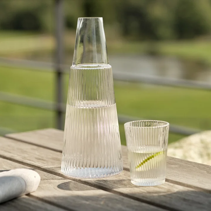 Pilastro Carafe with glass 1 l in clear from Stelton
