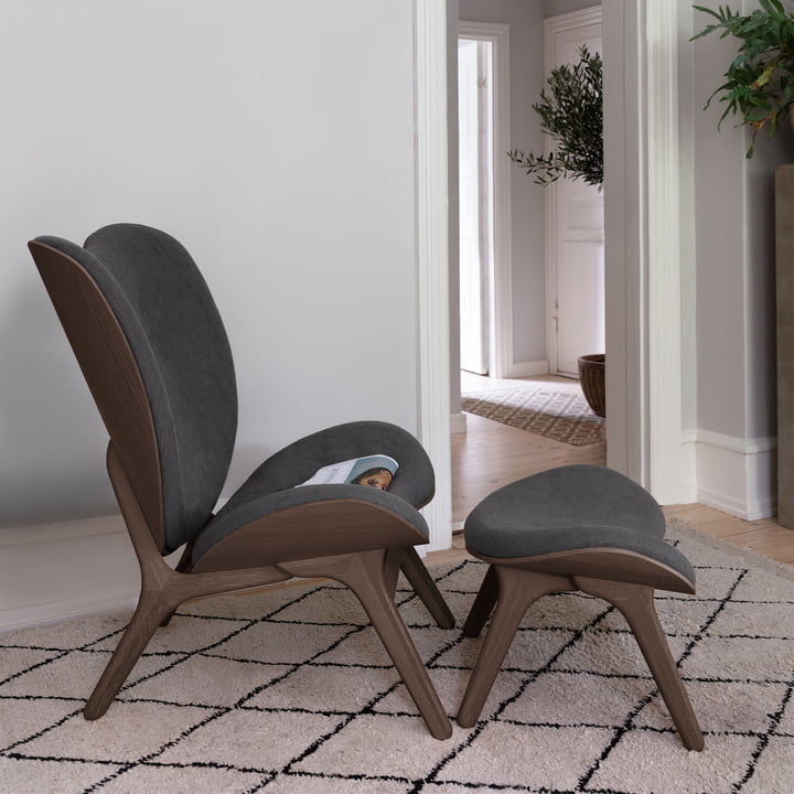 A Conversation Piece Tall armchair and ottoman by Umage