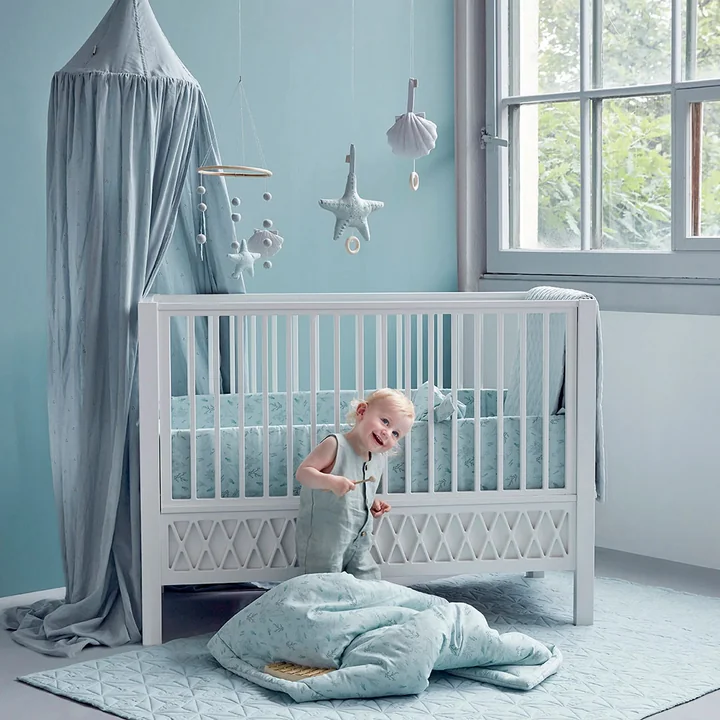 Harlequin baby crib from Cam Cam Copenhagen in the color white