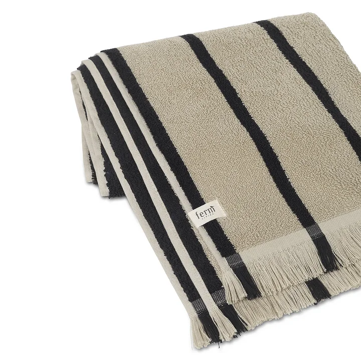 Alee Bath towel, sand / black by Ferm Living