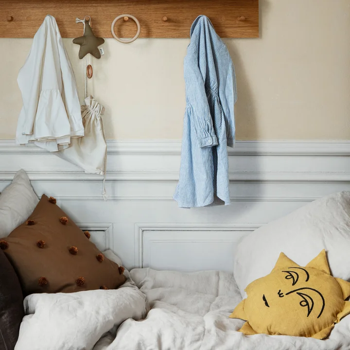 Sun Pillow and star music box from Ferm Living