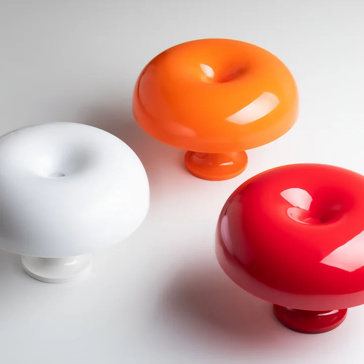 Nessino Table lamp from Artemide in the color red