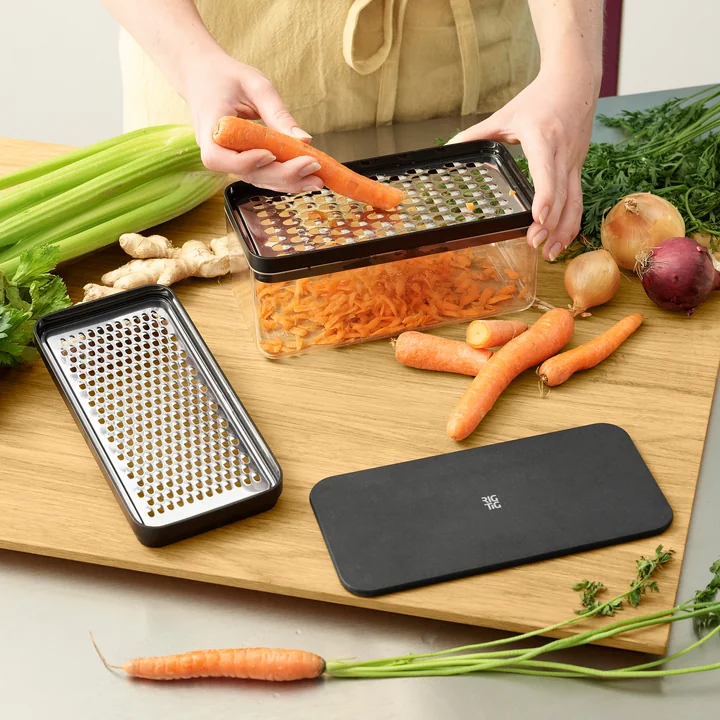 Grate-It grater with container from Rig-Tig by Stelton in color black