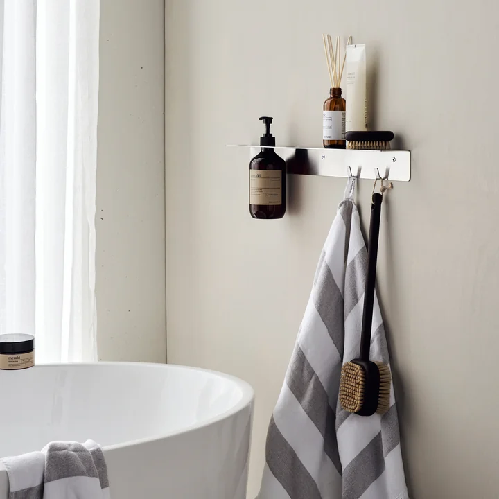 Shelf with bottle holder and hook bar from Meraki