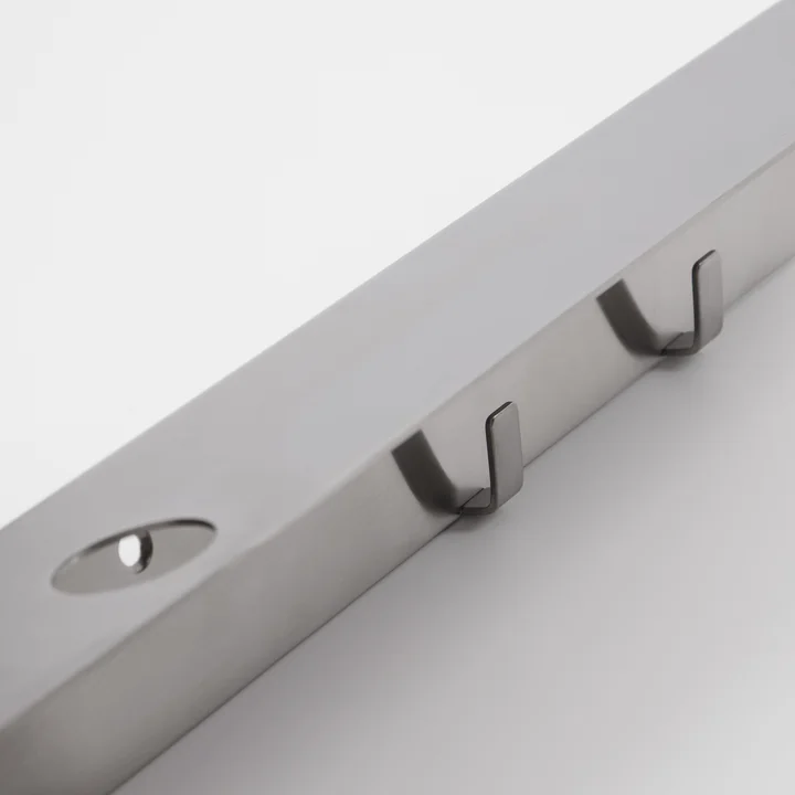 Shelf with bottle holder and hook bar from Meraki
