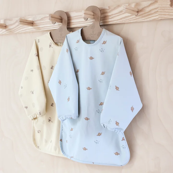 Dino bib with long sleeves from OYOY