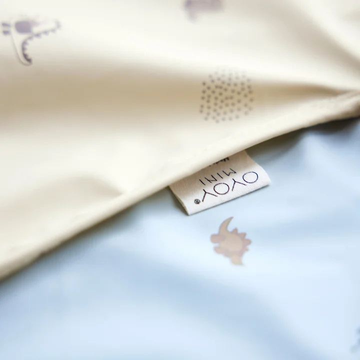 Dino bib with long sleeves from OYOY