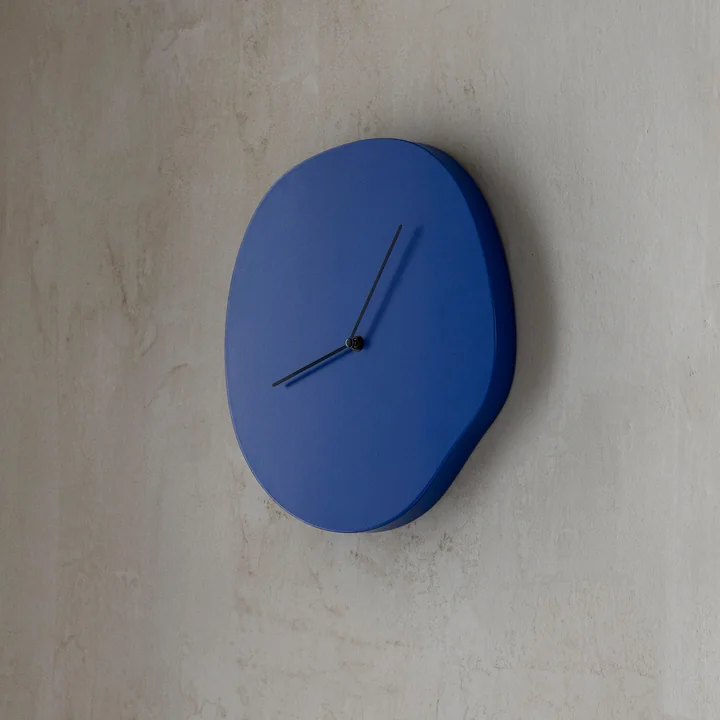 Melt Wall clock from Ferm Living in the color blue