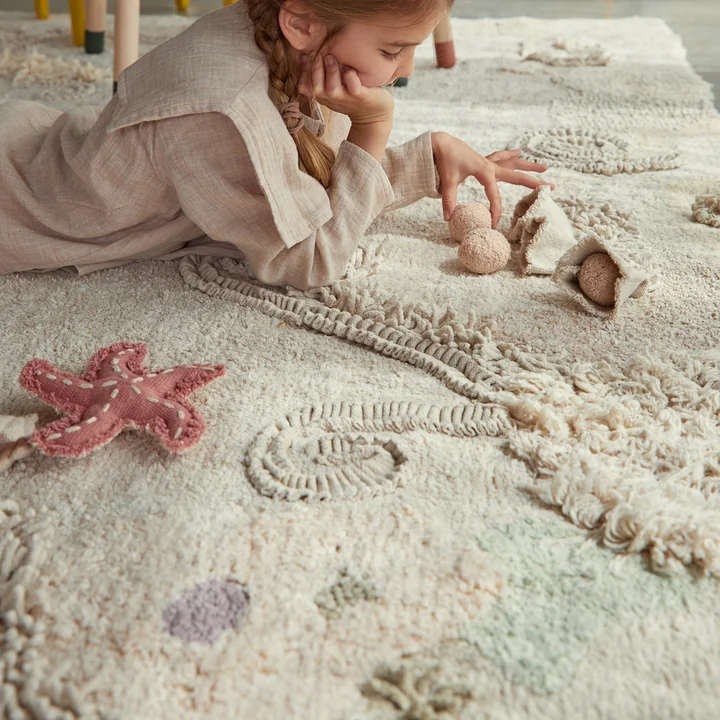 Seabed Play carpet with play accessories from Lorena Canals