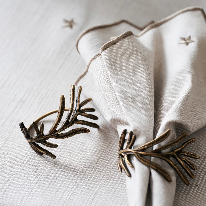 Mistle Napkin rings from House Doctor in the color antique brass