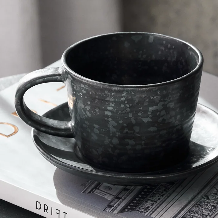 Pion cup with coaster from House Doctor in the version black / brown