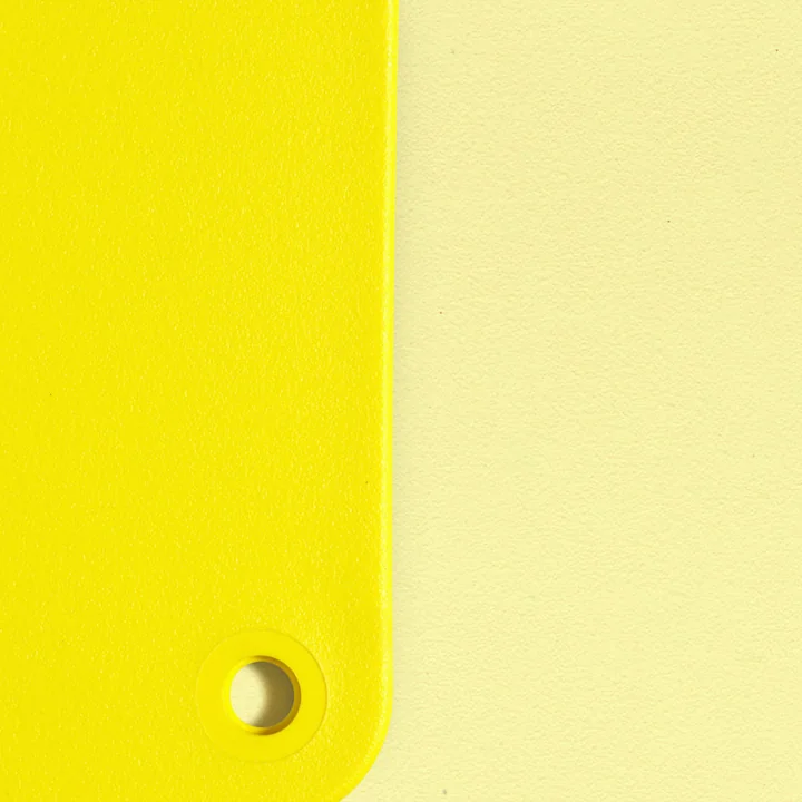 Eames Plastic RE material samples from Vitra in the colors sunlight and citron