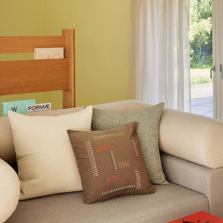 Elodie cushion cover and Forma magazine holder from Hübsch Interior
