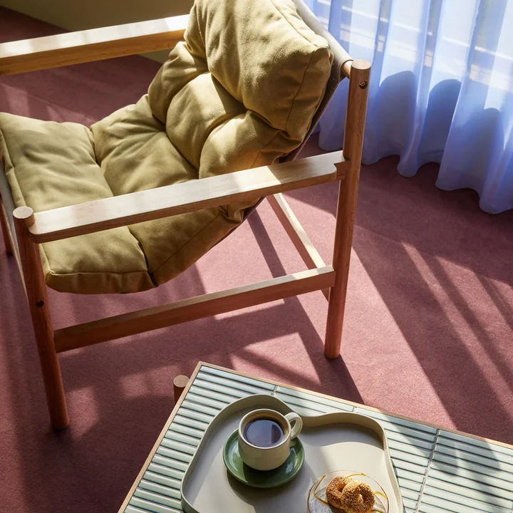 Heritage lounge chair with stool from Hübsch Interior