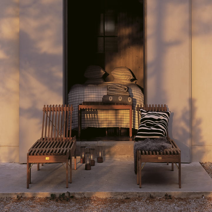 The Riviera Loungers from Skagerak on a wooden balcony