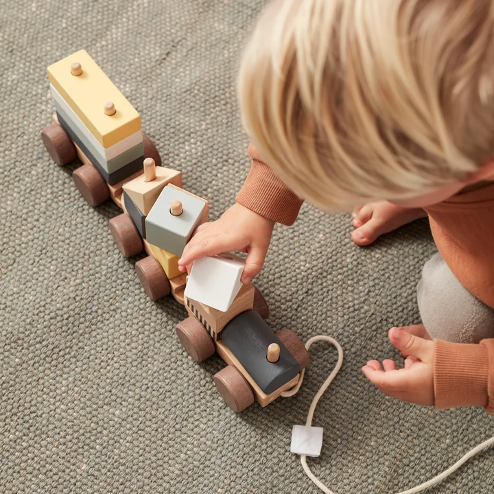 Train with wooden blocks from Kids Concept
