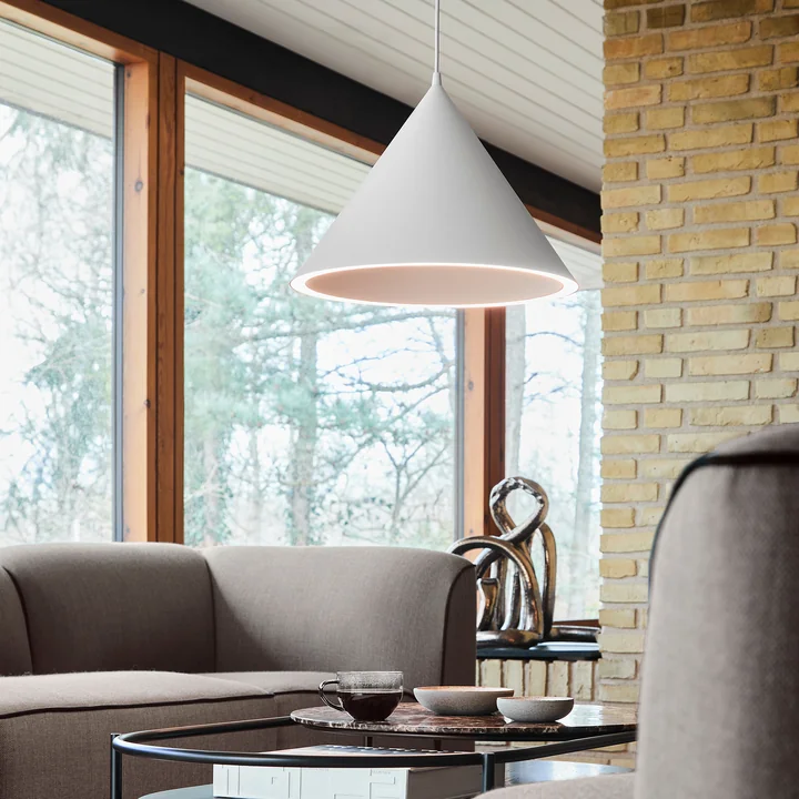 Annular LED Pendant Light and Mono Dining Chair by Woud
