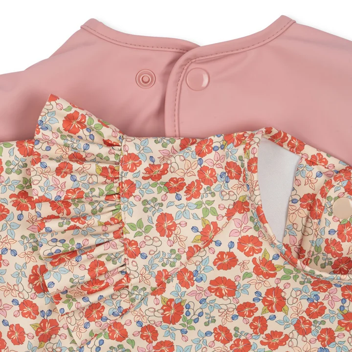 Konges Sløjd - Bib with sleeves and ruffles, kalkua / bridal rose (set of 2)