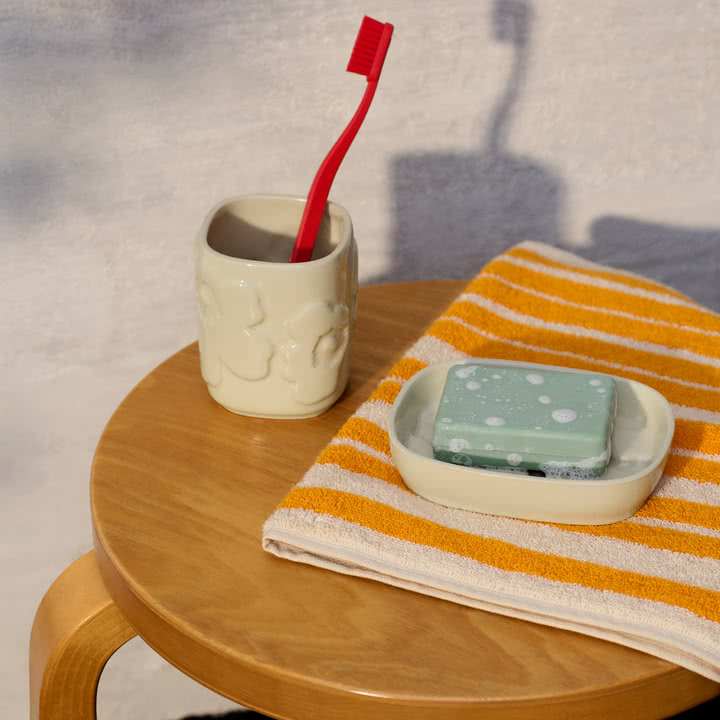 Marimekko - Raide bath towel, sahram yellow / cream, Unikko bathroom accessory set