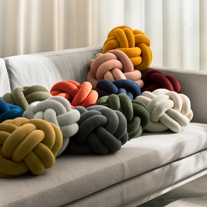 Design House Stockholm - Knot Cushion, pile on sofa