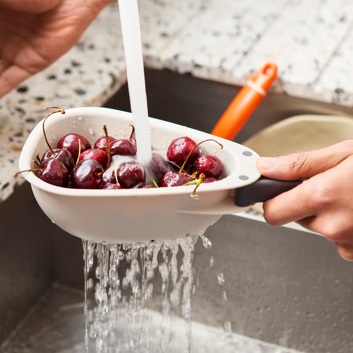 Joseph Joseph - Droplet Kitchen colander with foldable handles mini, stone