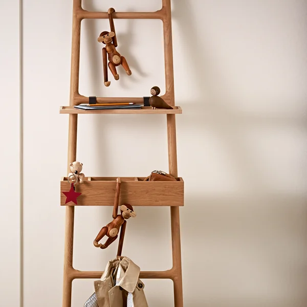 Wooden monkey, the bear and the lovebirds from Kay Bojesen on a ladder
