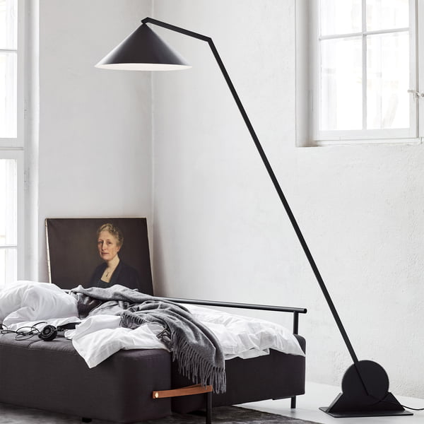 The Northern - Gear floor lamp next to the bed