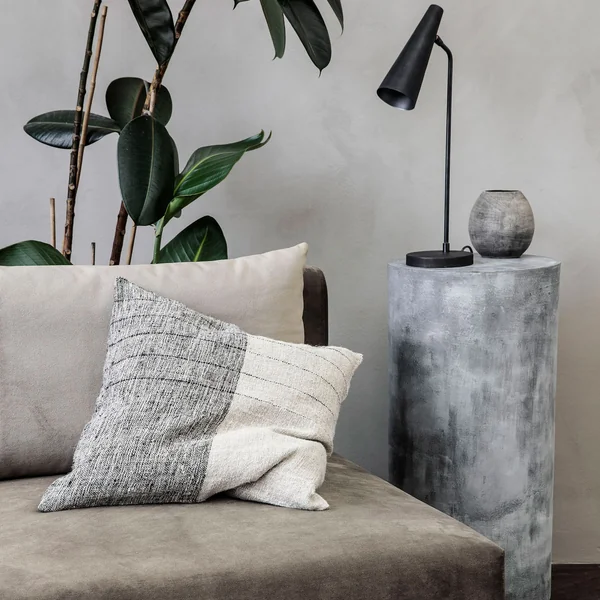 Dived cushion cover from House Doctor on the sofa