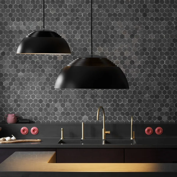 The AJ Royal pendant lamp, black from Louis Poulsen above the sink in the kitchen