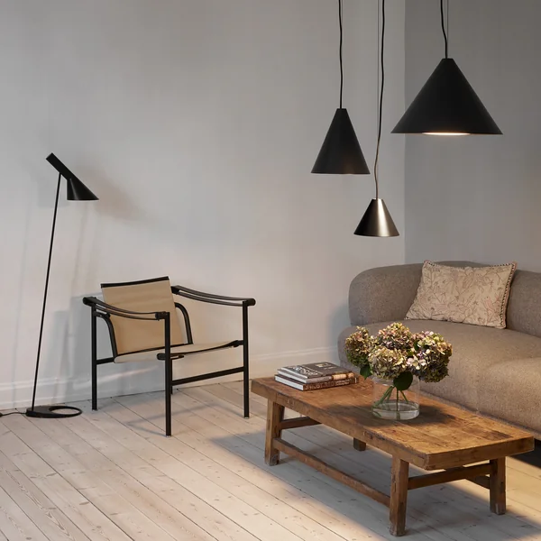 The Keglen pendant lamp, black from Louis Poulsen in combination in the living room