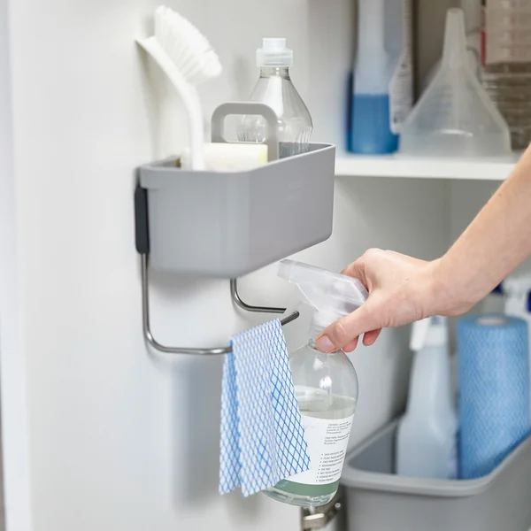 The DoorStore dishwasher organiser from Joseph Joseph hidden in the kitchen cupboard