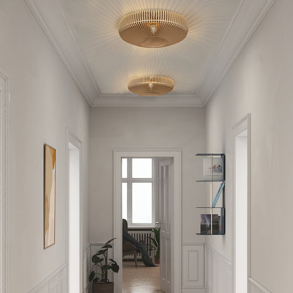 The Clava Up Wood lampshade from Umage as a ceiling lamp in the hallway