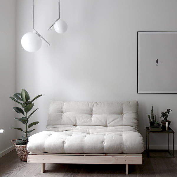 The Roots Sofa bed from Karup design in a minimalist room